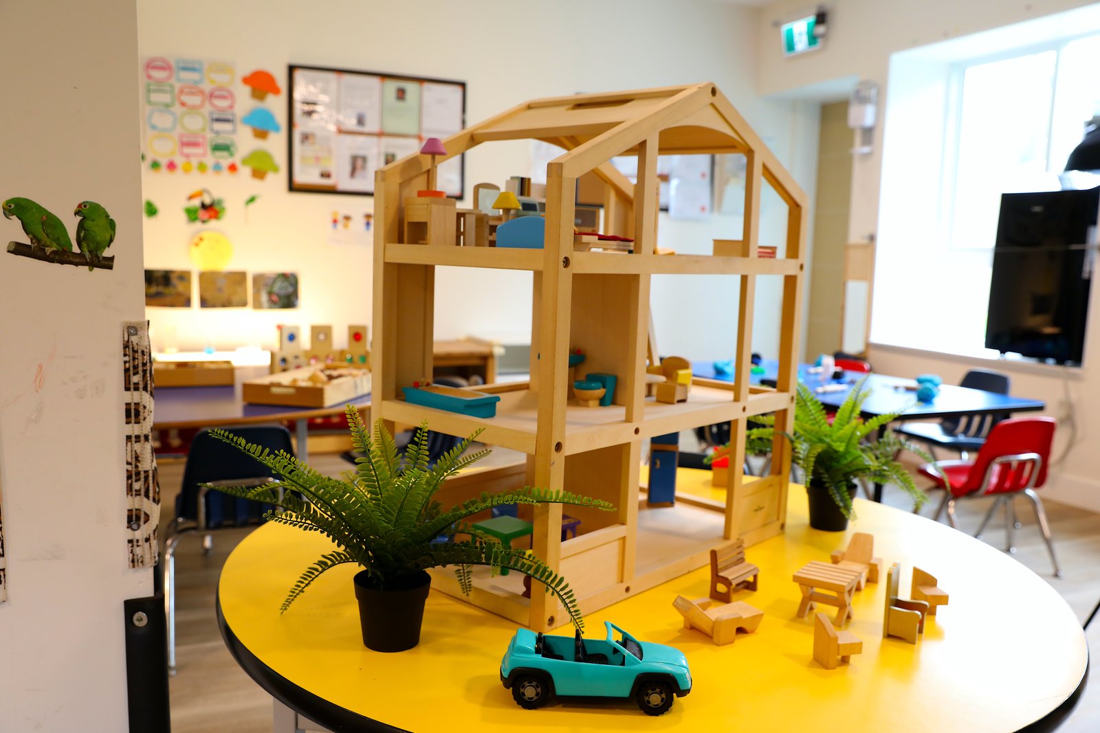 Wooden doll house with furniture