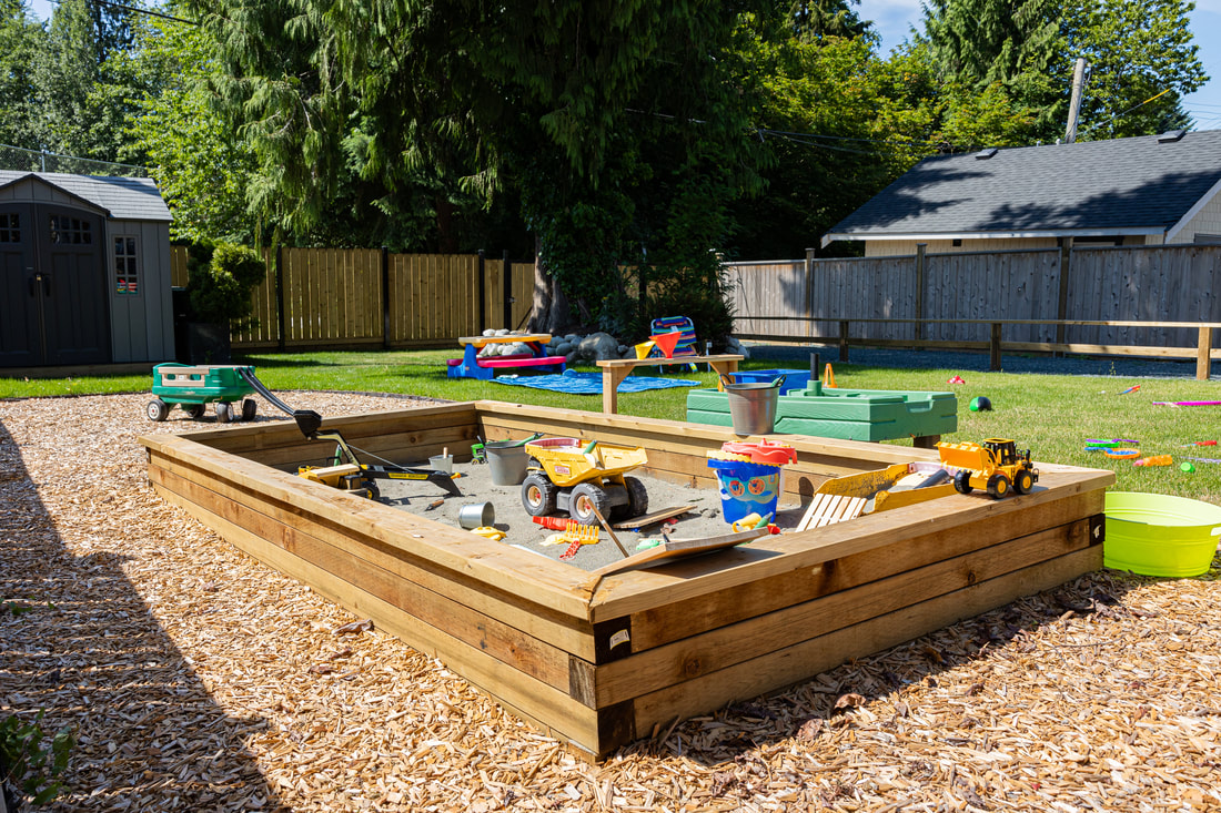 Large sandpit in sunny conditions